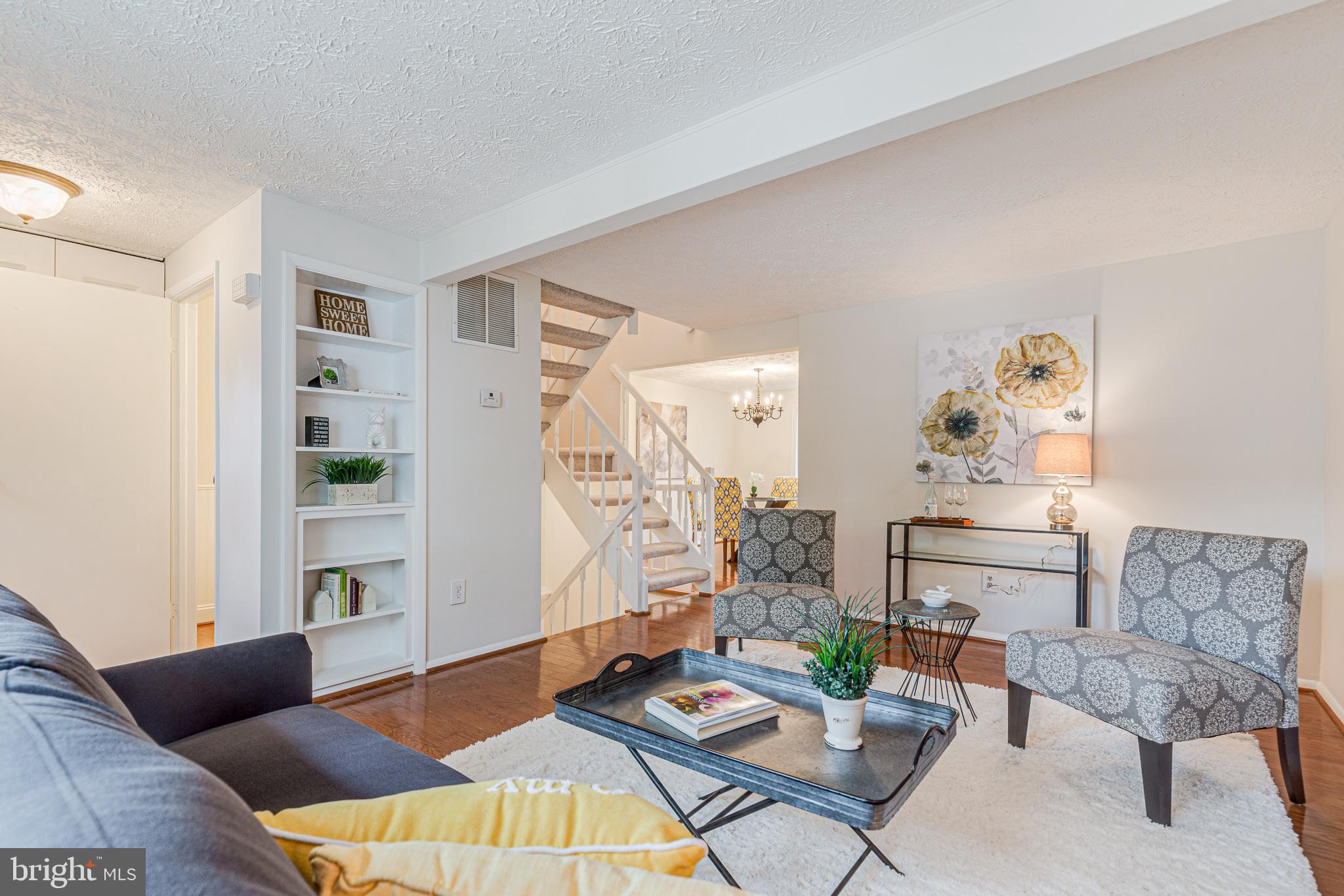 11500 Ivy Bush Court Reston, VA 20191 - Photo 6 of 33 A built-in bookcase is perfect for framed pictures