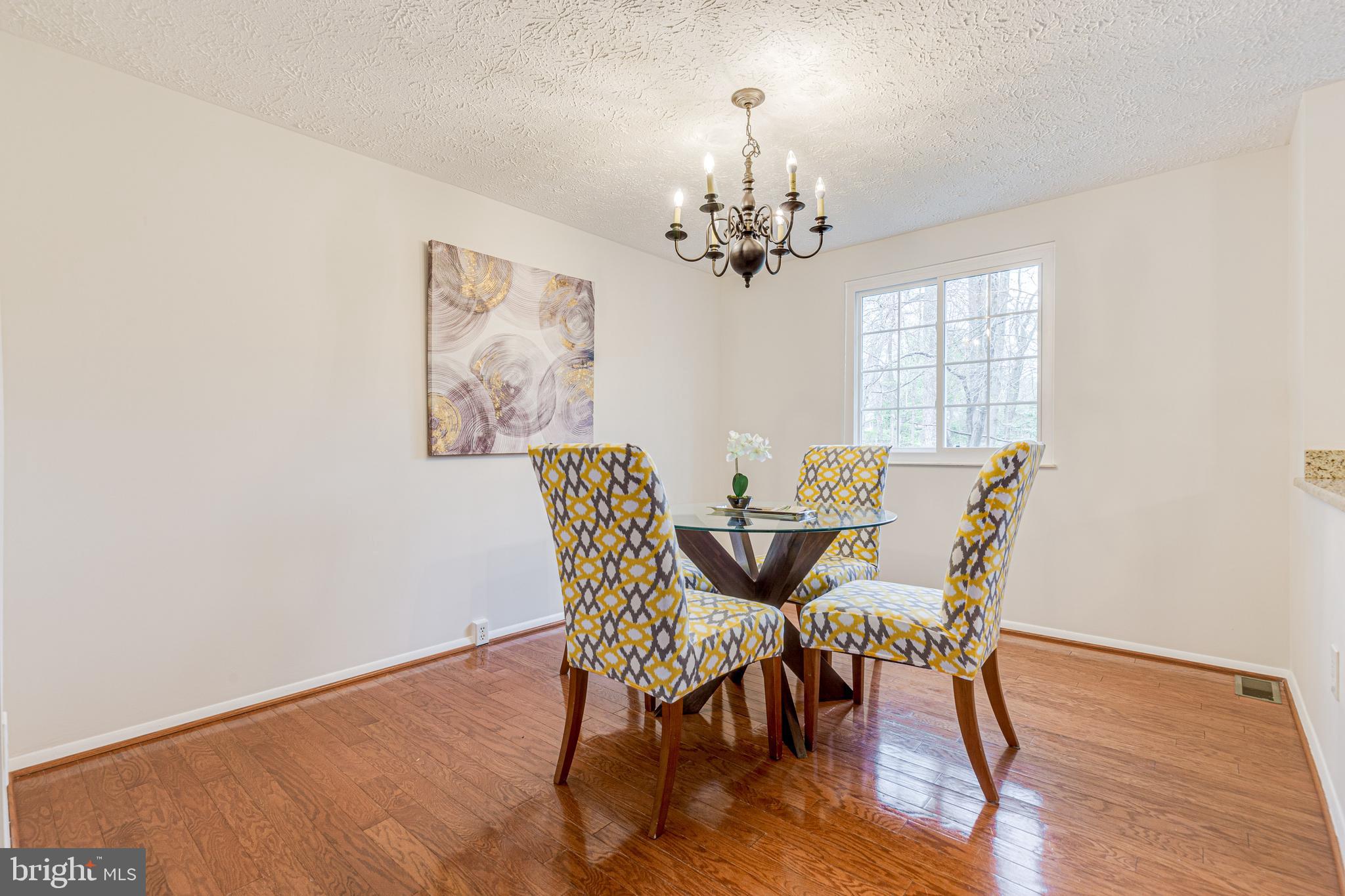 11500 Ivy Bush Court Reston, VA 20191 - Photo 7 of 33 The dining room has a wooded view.