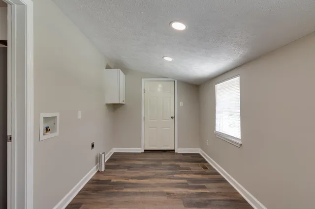 a view of backyard with green space