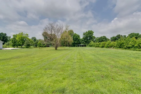 a view of a golf course with a garden