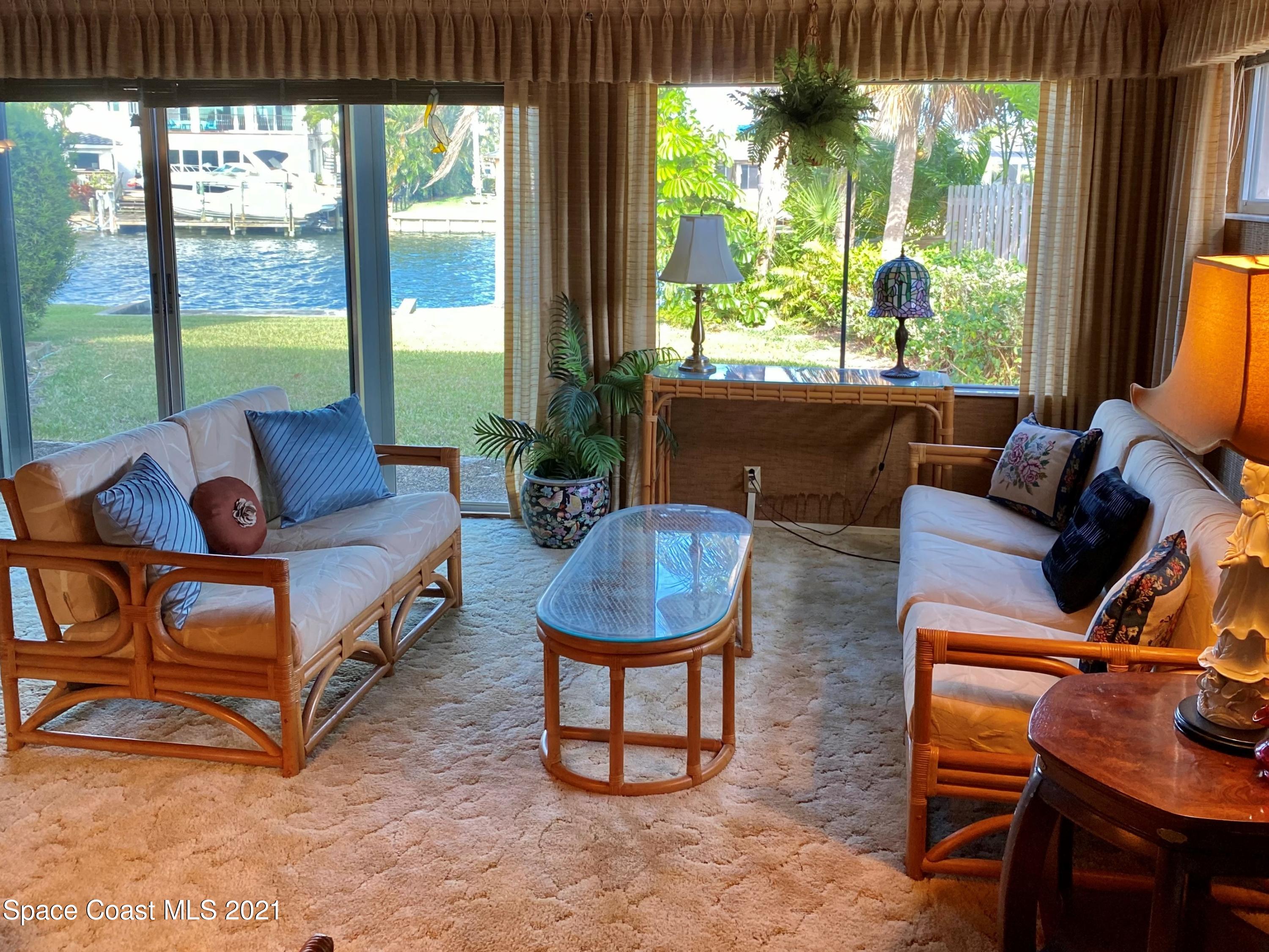 47 Country Club Road Cocoa Beach, FL 32931 - Photo 3 of 32 Wall of Windows