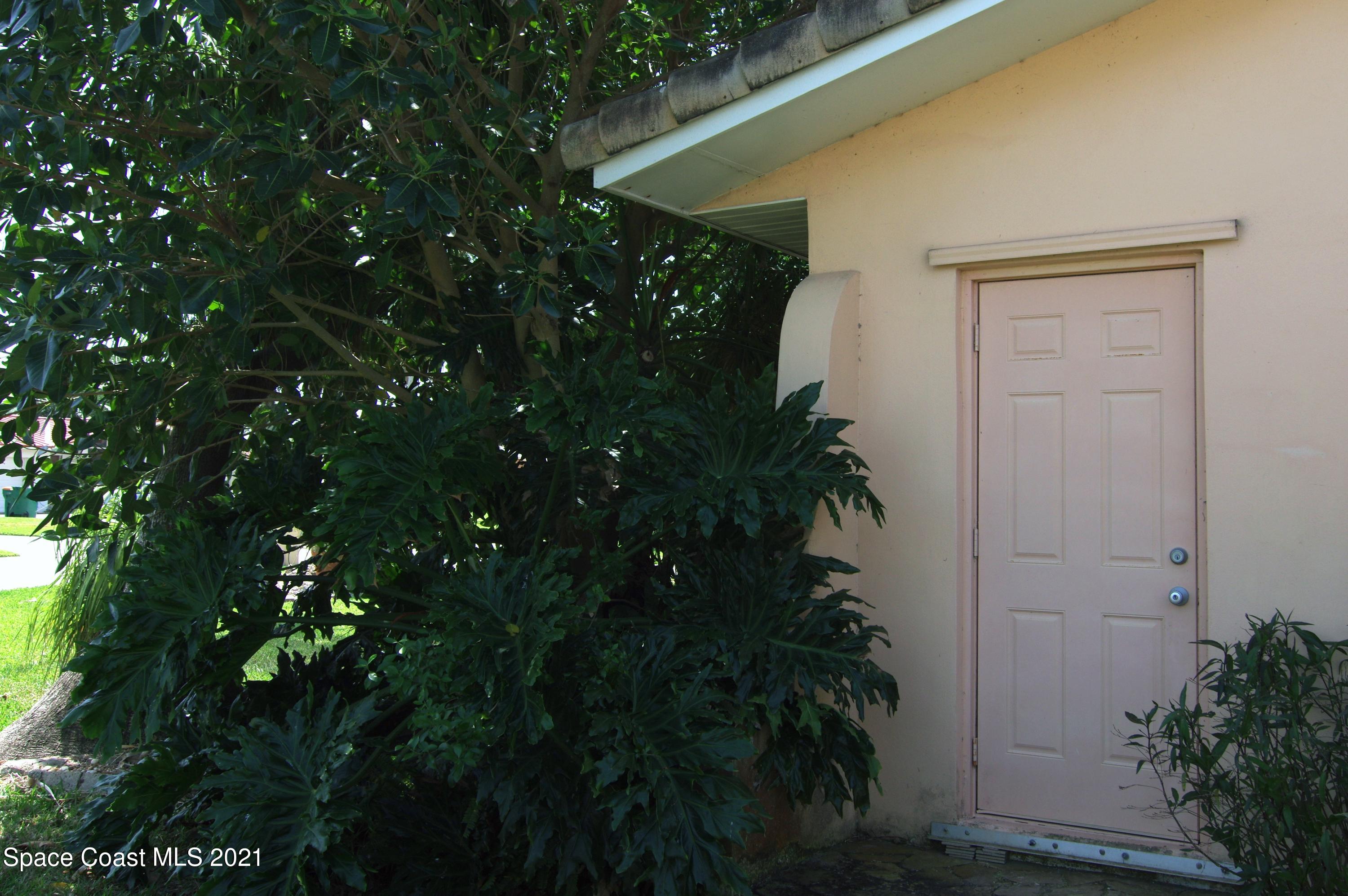 47 Country Club Road Cocoa Beach, FL 32931 - Photo 22 of 32 utility door 02