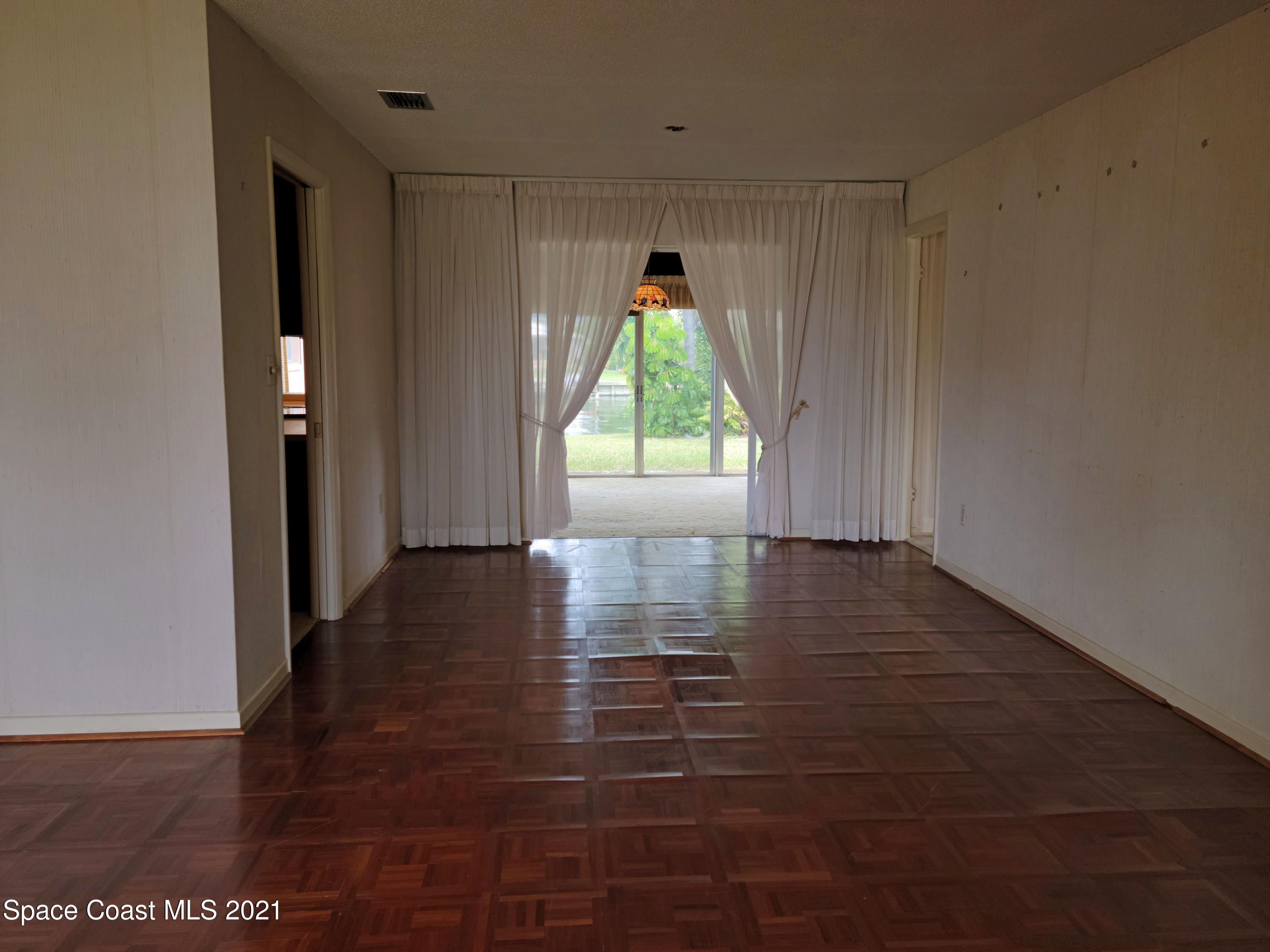 47 Country Club Road Cocoa Beach, FL 32931 - Photo 9 of 32 dining room before
