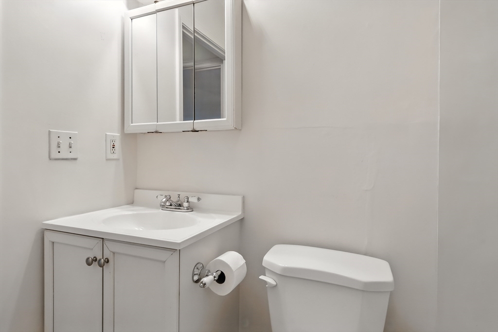 18 Kenmar Drive, Unit 149 Billerica, MA 01821 - Photo 12 of 13 a bathroom with a sink and a toilet