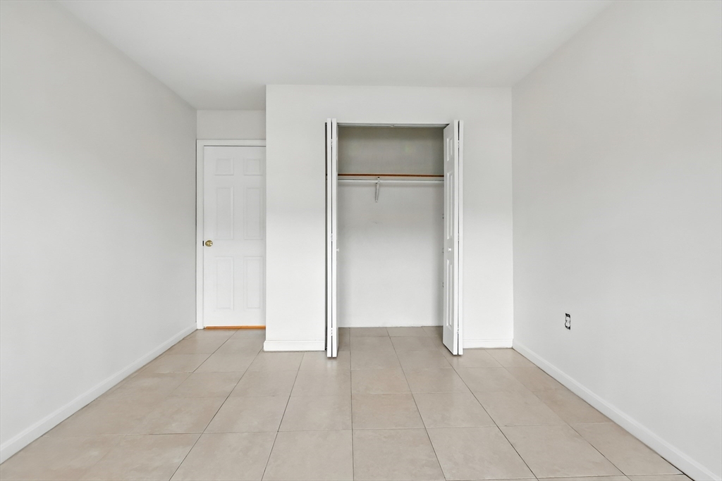18 Kenmar Drive, Unit 149 Billerica, MA 01821 - Photo 10 of 13 a view of an empty room and closet area