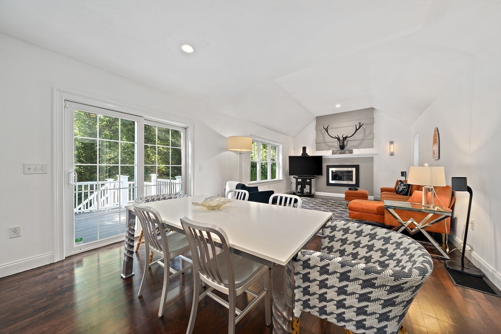 340 Old Oaken Bucket Road Norwell, MA 02061 - Photo 11 of 37 a view of a dining room with furniture window and wooden floor