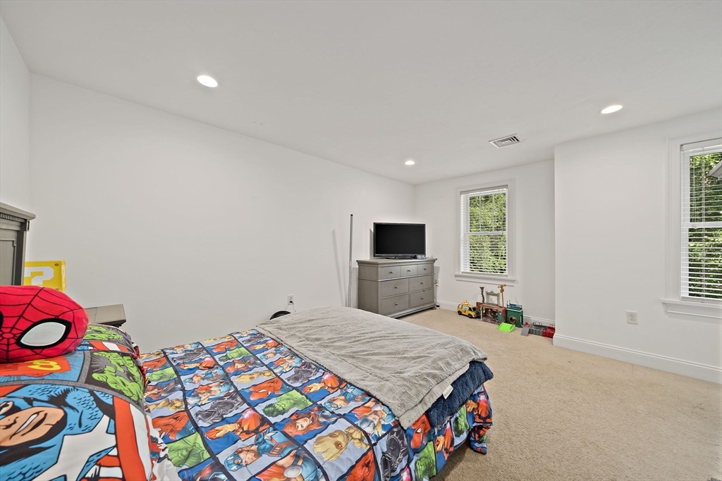 340 Old Oaken Bucket Road Norwell, MA 02061 - Photo 21 of 37 a bedroom with a bed and a window