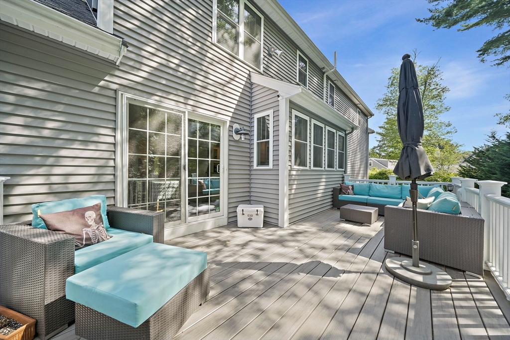 340 Old Oaken Bucket Road Norwell, MA 02061 - Photo 29 of 37 a backyard of a house with seating space