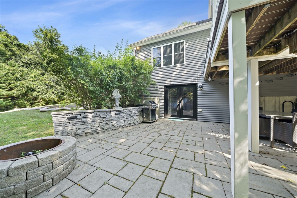 340 Old Oaken Bucket Road Norwell, MA 02061 - Photo 30 of 37 a view of a house with a yard