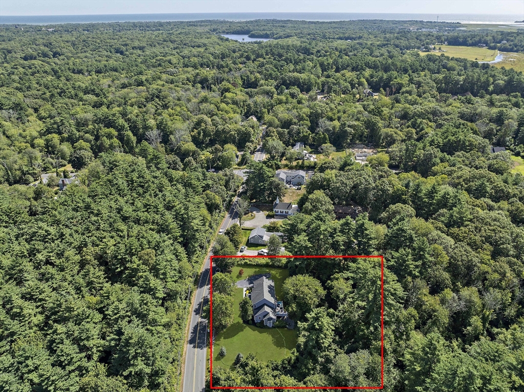 340 Old Oaken Bucket Road Norwell, MA 02061 - Photo 36 of 37 an aerial view of residential house with outdoor space and trees all around