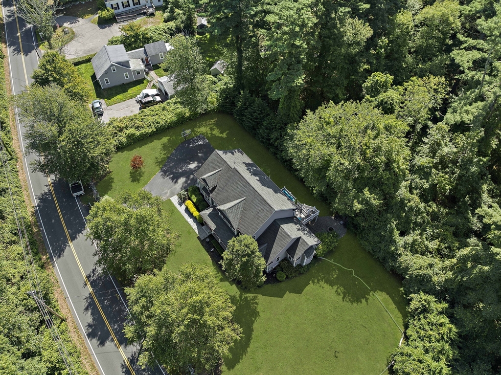 340 Old Oaken Bucket Road Norwell, MA 02061 - Photo 37 of 37 an aerial view of a house with a yard