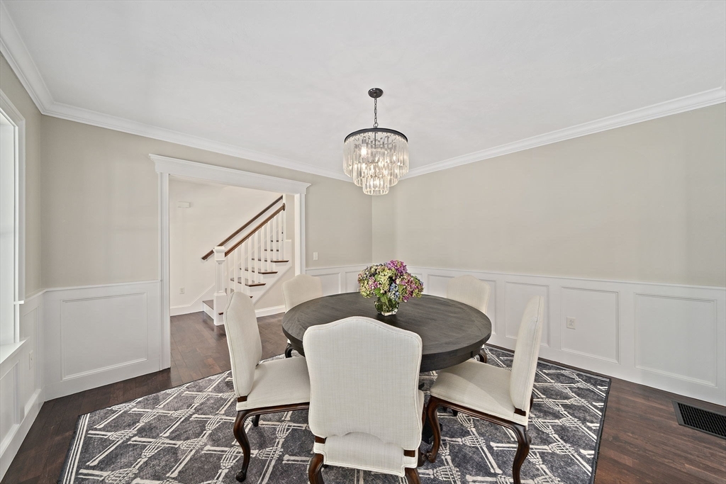 340 Old Oaken Bucket Road Norwell, MA 02061 - Photo 6 of 37 a dining room with furniture and wooden floor