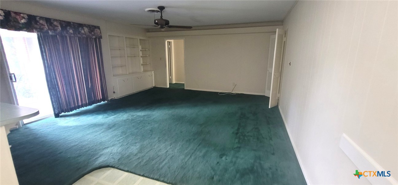 2602 College Drive Victoria, TX 77901 - Photo 18 of 29 wooden floor in an empty room