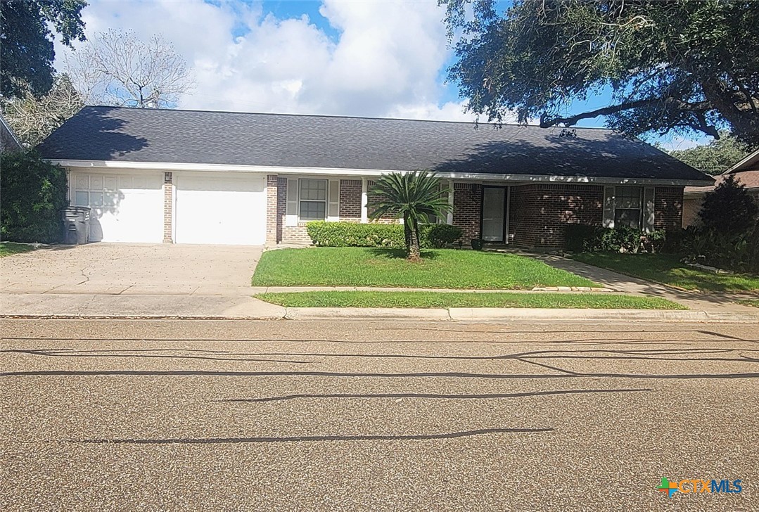 2602 College Drive Victoria, TX 77901 - Photo 2 of 29 a front view of house with yard and green space