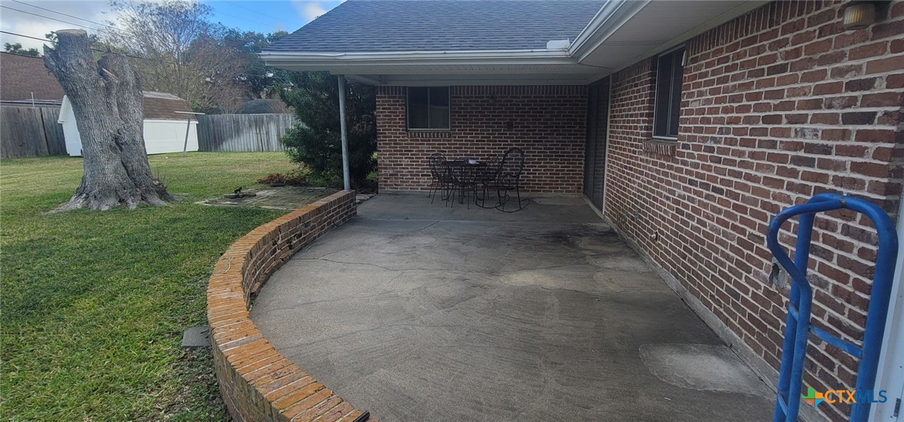 2602 College Drive Victoria, TX 77901 - Photo 4 of 29 a view of a pathway of a house with backyard