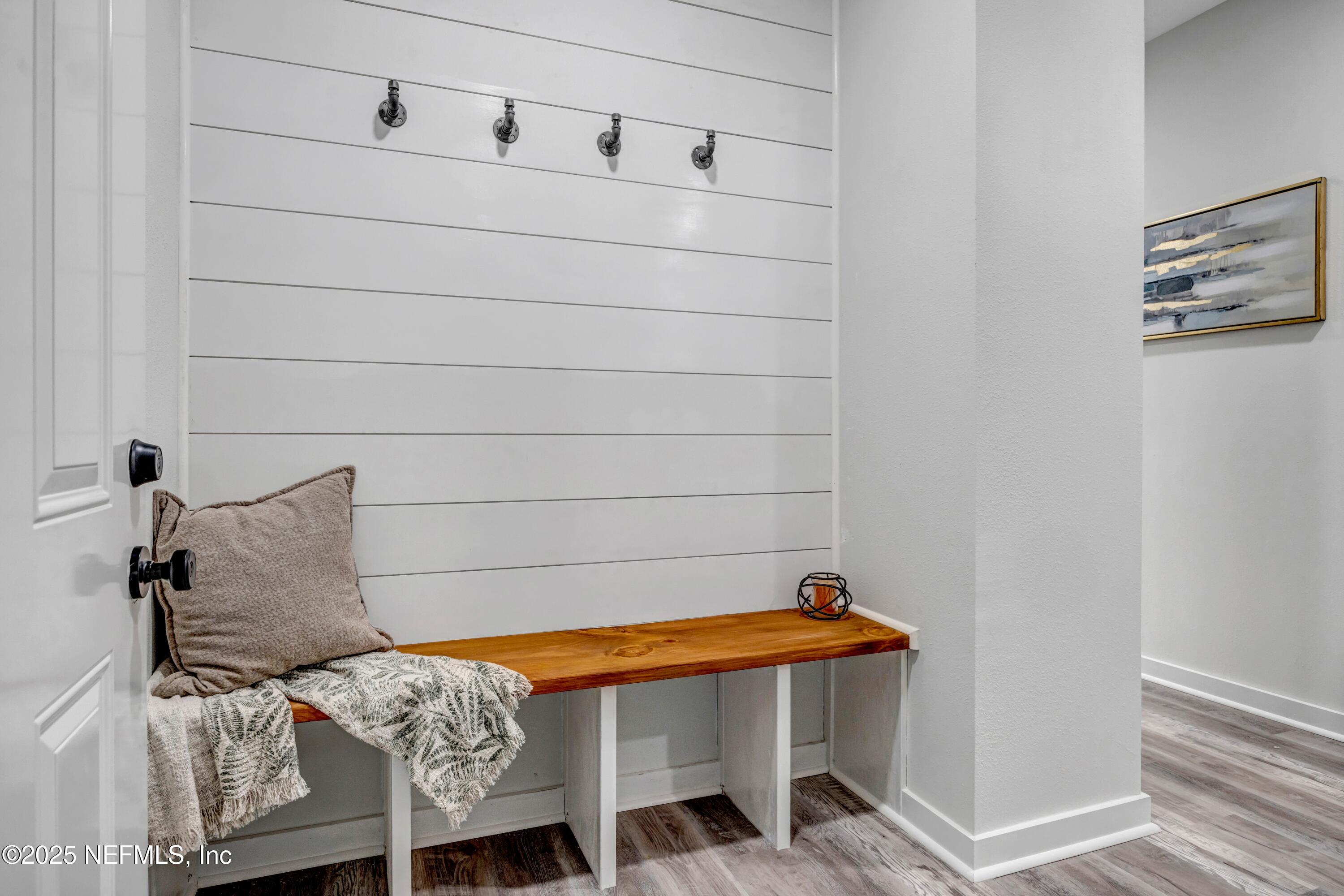 85 Delmonte Street Baldwin, FL 32234 - Photo 6 of 34 a bathroom with a table and chair