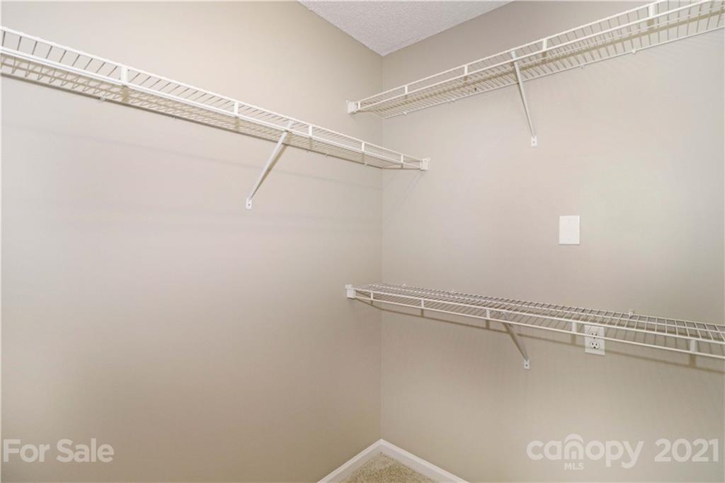 1509 Summit Ridge Lane Kannapolis, NC 28083 - Photo 23 of 37 a view of a room with racks on the wall