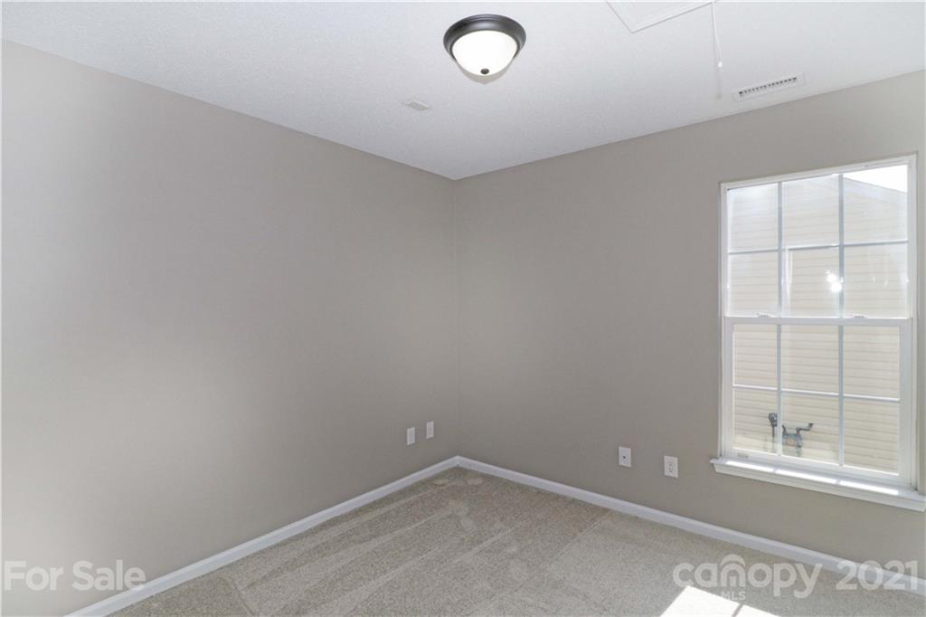 1509 Summit Ridge Lane Kannapolis, NC 28083 - Photo 27 of 37 an empty room with windows