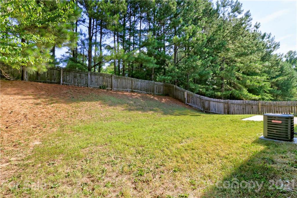 1509 Summit Ridge Lane Kannapolis, NC 28083 - Photo 4 of 37 a view of a backyard