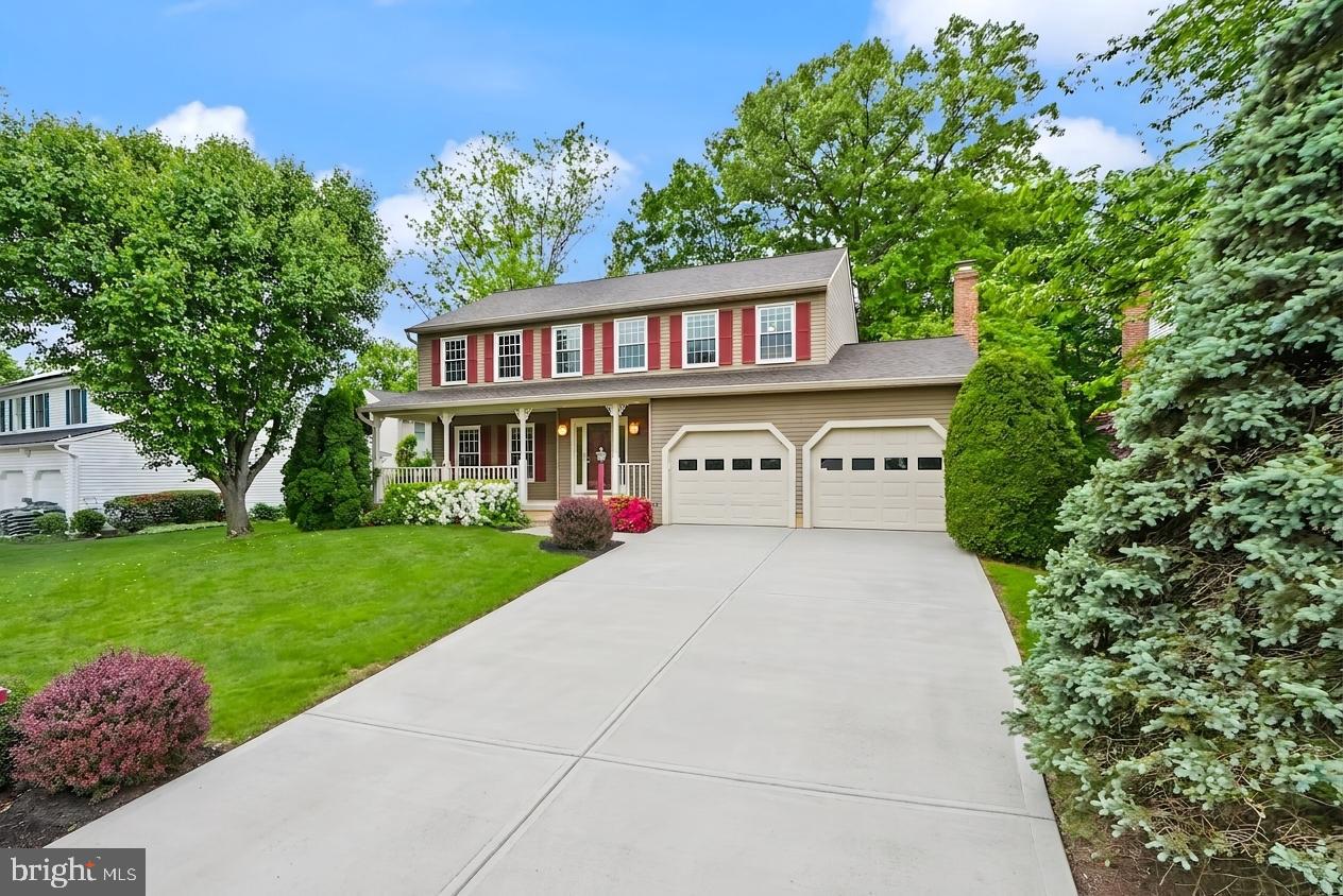 169 Applegate Drive Sterling, VA 20164 - Photo 2 of 55 a front view of a house with garden