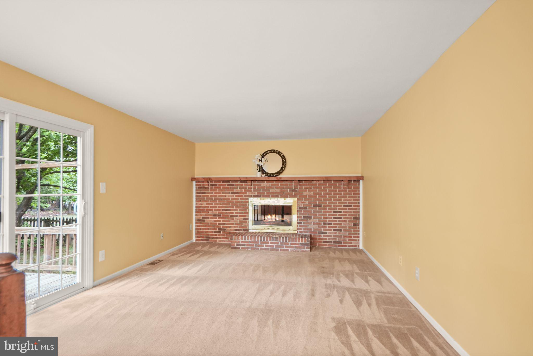 169 Applegate Drive Sterling, VA 20164 - Photo 22 of 55 a view of an empty room and glass door