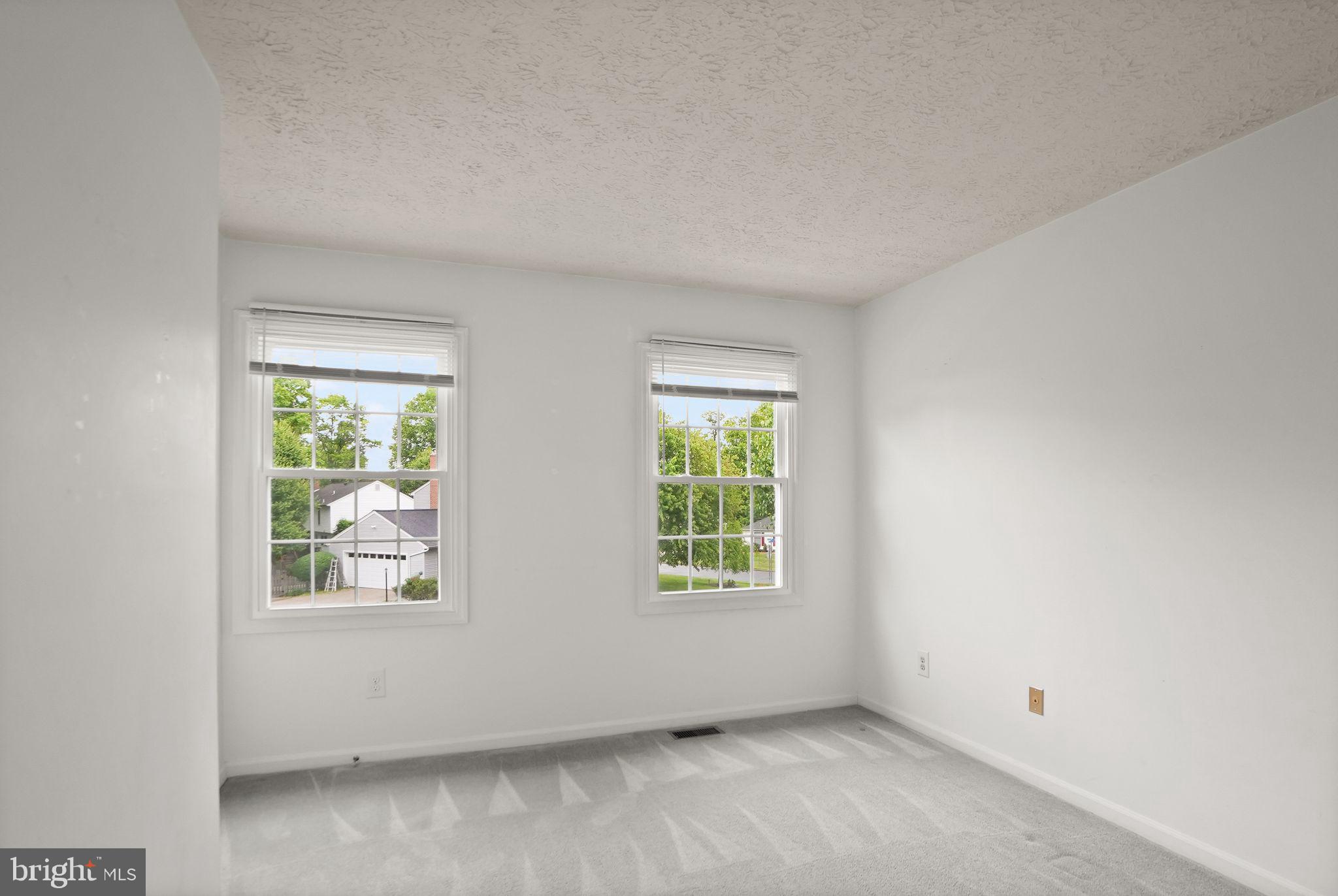 169 Applegate Drive Sterling, VA 20164 - Photo 33 of 55 an empty room with windows
