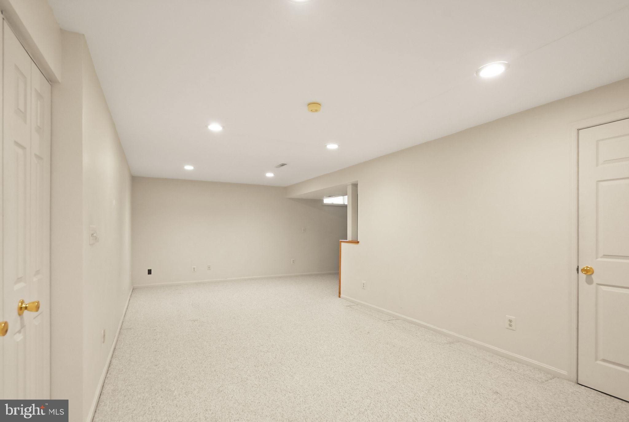 169 Applegate Drive Sterling, VA 20164 - Photo 40 of 55 an empty room with cabinet and shower