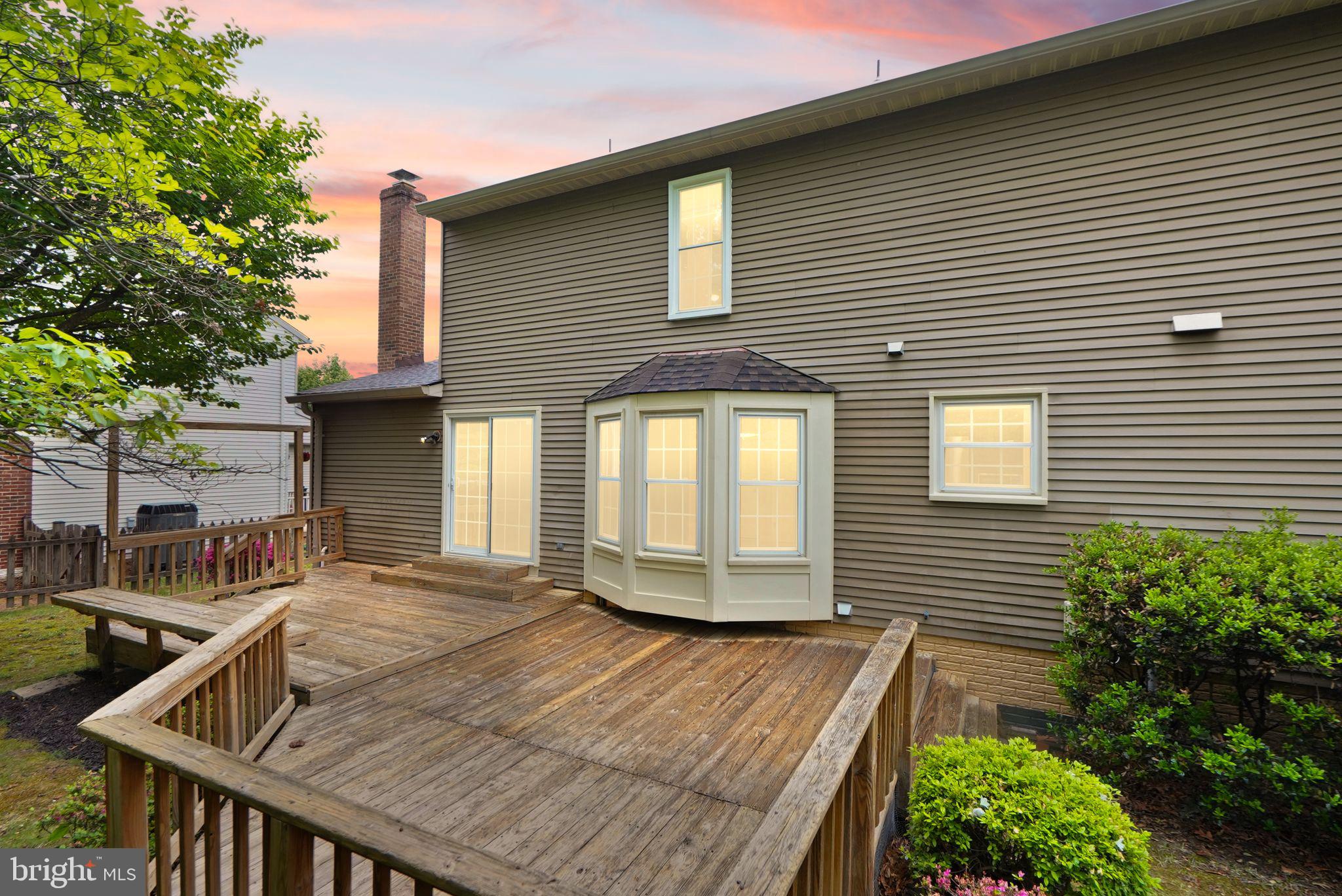 169 Applegate Drive Sterling, VA 20164 - Photo 50 of 55 a view of backyard with a deck