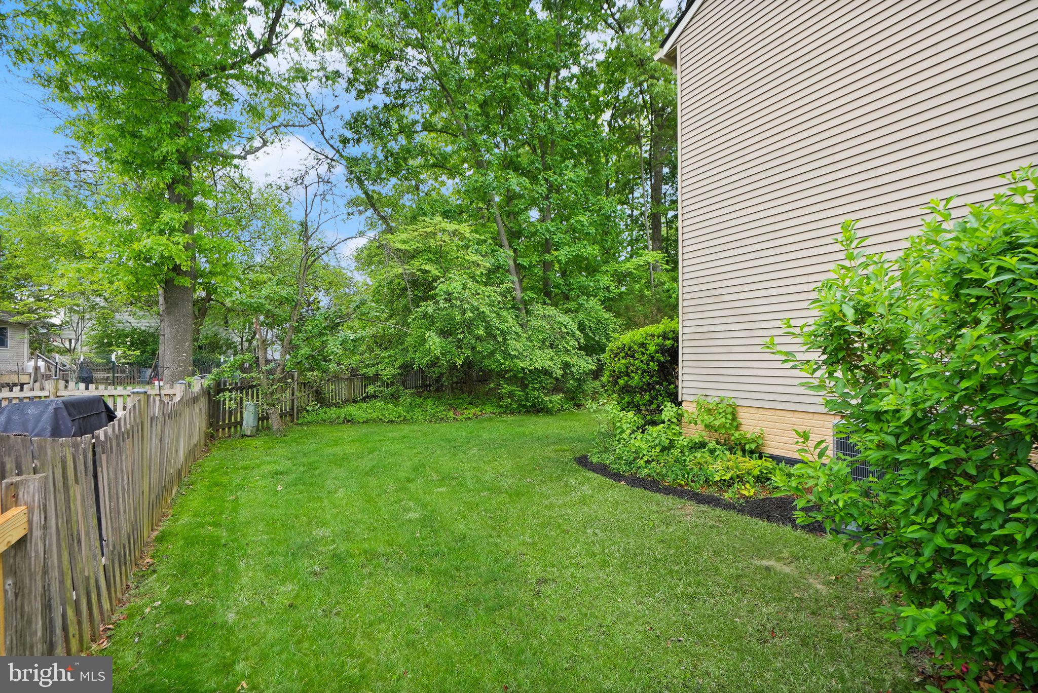 169 Applegate Drive Sterling, VA 20164 - Photo 54 of 55 a view of a house with a backyard