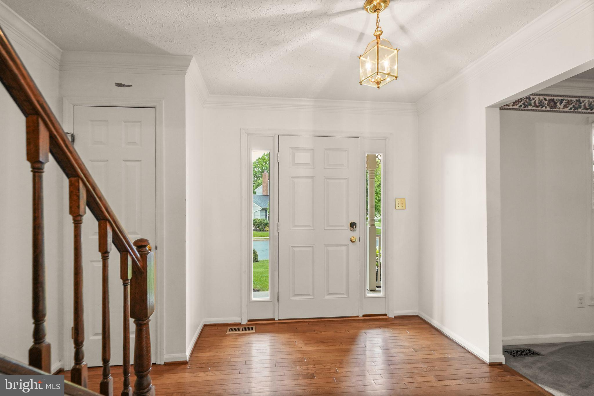 169 Applegate Drive Sterling, VA 20164 - Photo 8 of 55 a view of an entryway with wooden floor