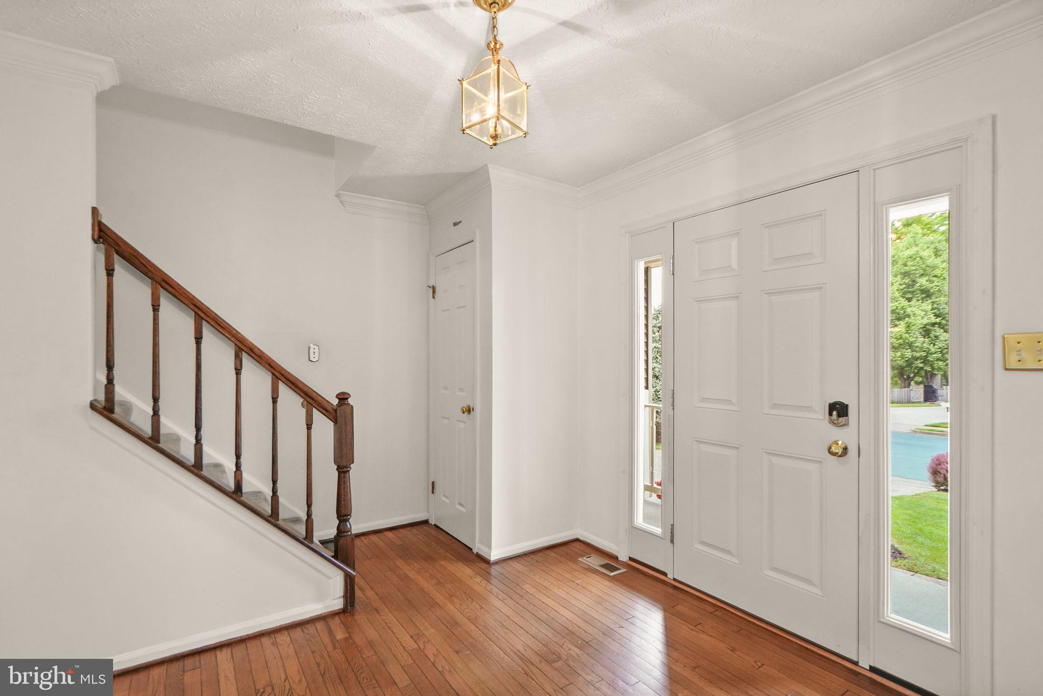 169 Applegate Drive Sterling, VA 20164 - Photo 9 of 55 a view of an entryway with hardwood floor and interior