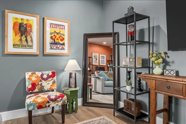a bedroom with a bed and furniture