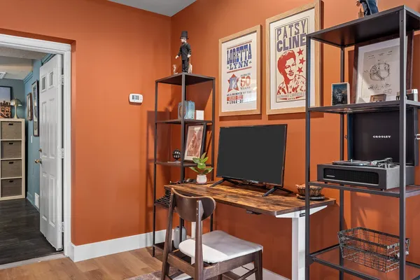 a view of a workspace with furniture