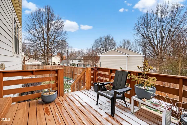 a balcony view with a seating space