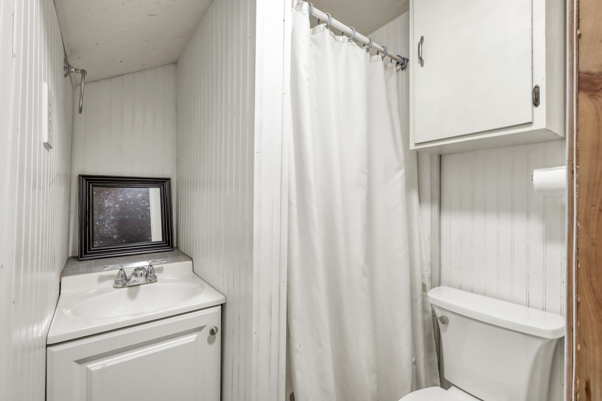 254 Sharp Lane Trinity, TX 75862 - Photo 26 of 36 a bathroom with a sink and a toilet
