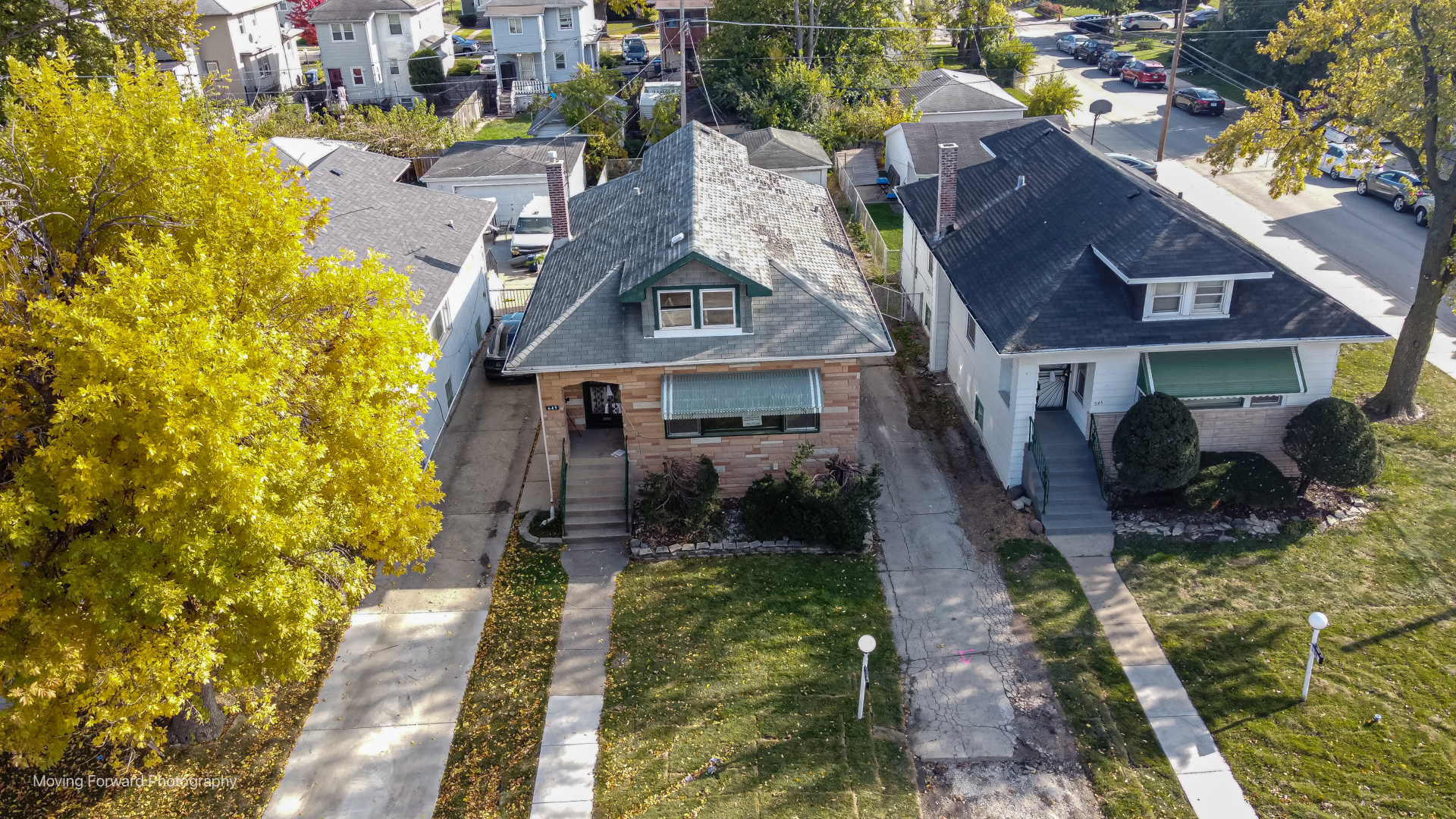 643 South 19th Avenue Maywood, IL 60153 - Photo 5 of 41 a front view of a house with garden