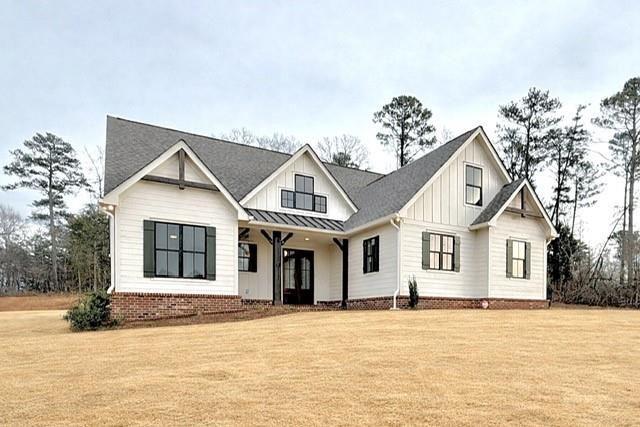 122 Palisade Drive Rydal, GA 30171 - Photo 1 of 54 a front view of a house with a yard