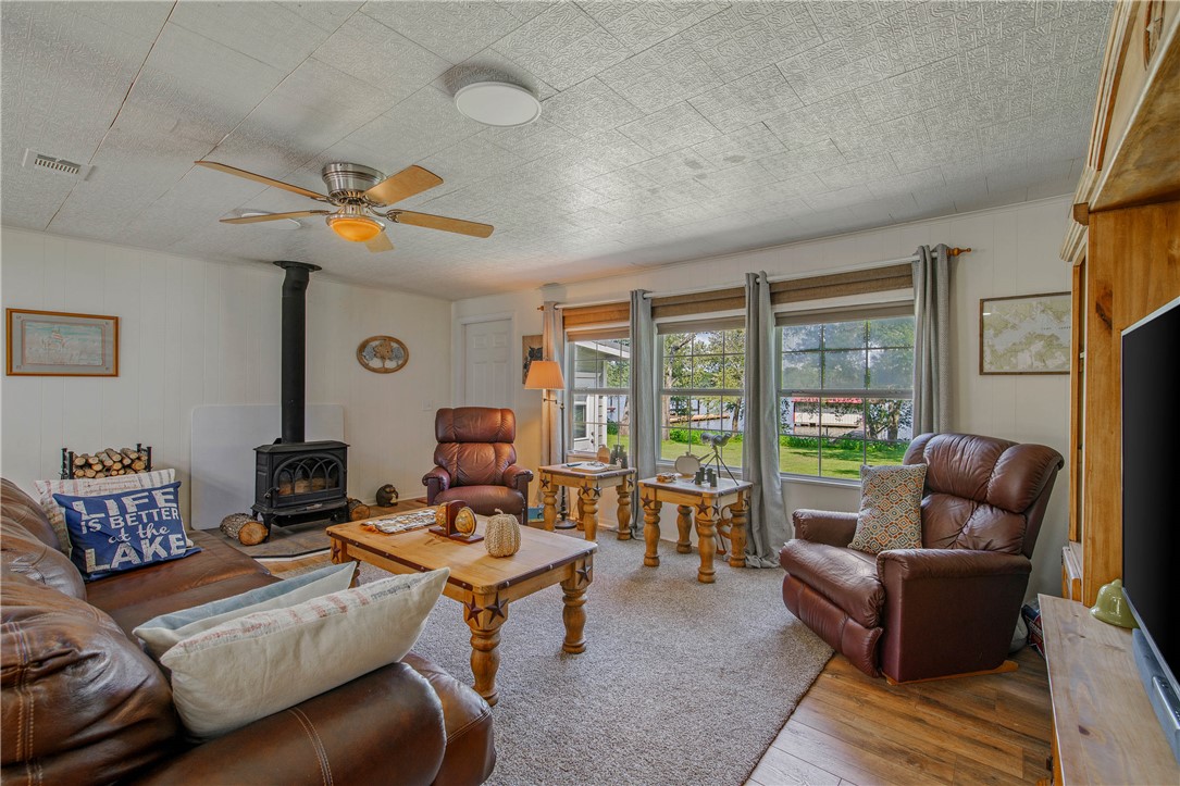 11001 Clyde Acord Road Franklin, TX 77856 - Photo 12 of 43 a living room with furniture and a floor to ceiling window