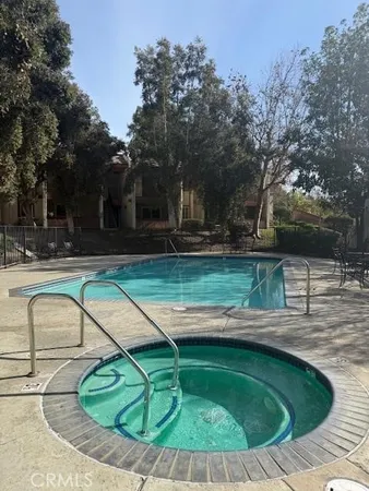 a view of a bench in a backyard