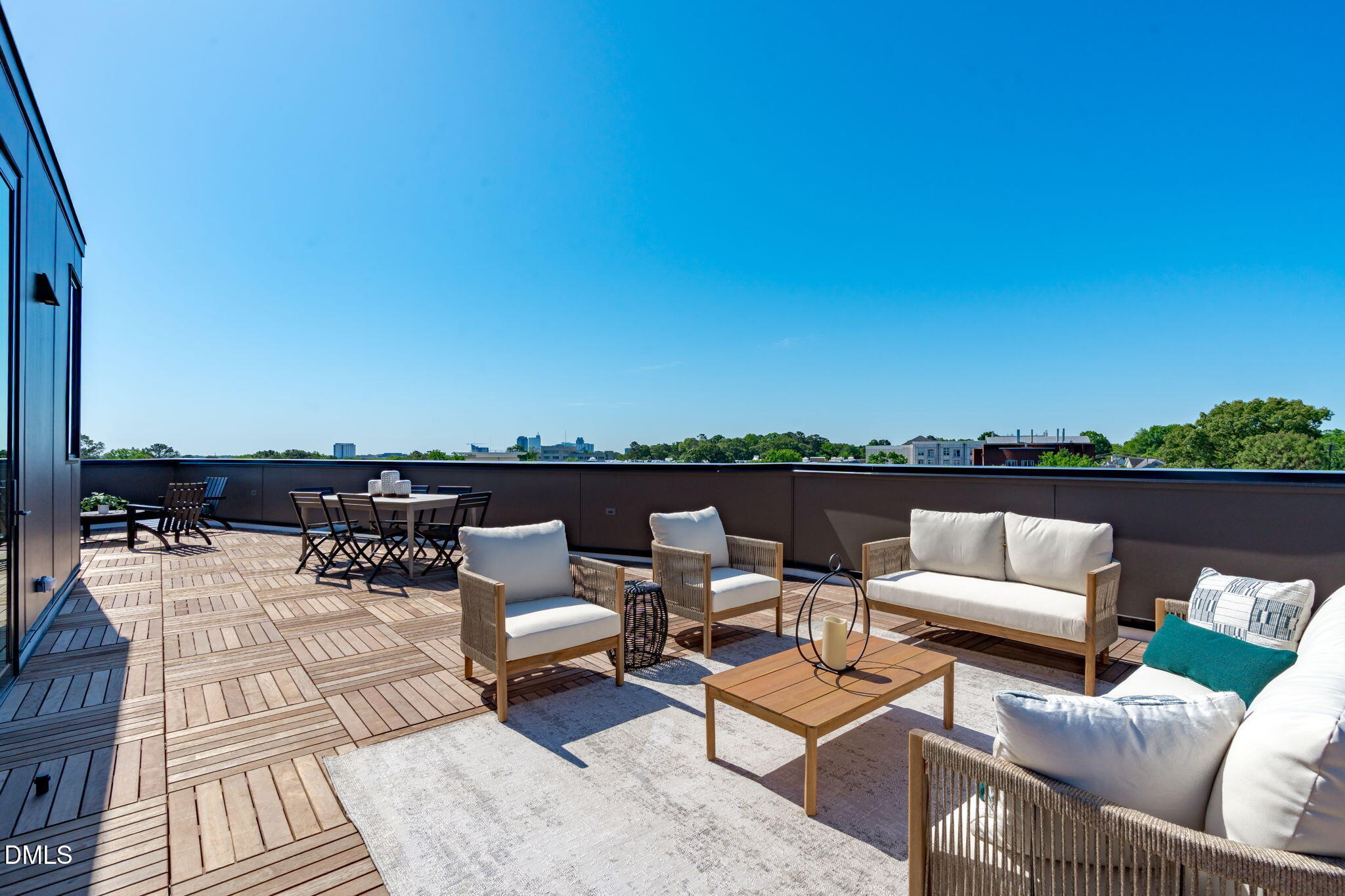 1304 Chamblee Hill Raleigh, NC 27608 - Photo 29 of 46 an outdoor living room with patio a couch and chairs