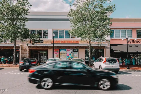 a car parked in front of a store