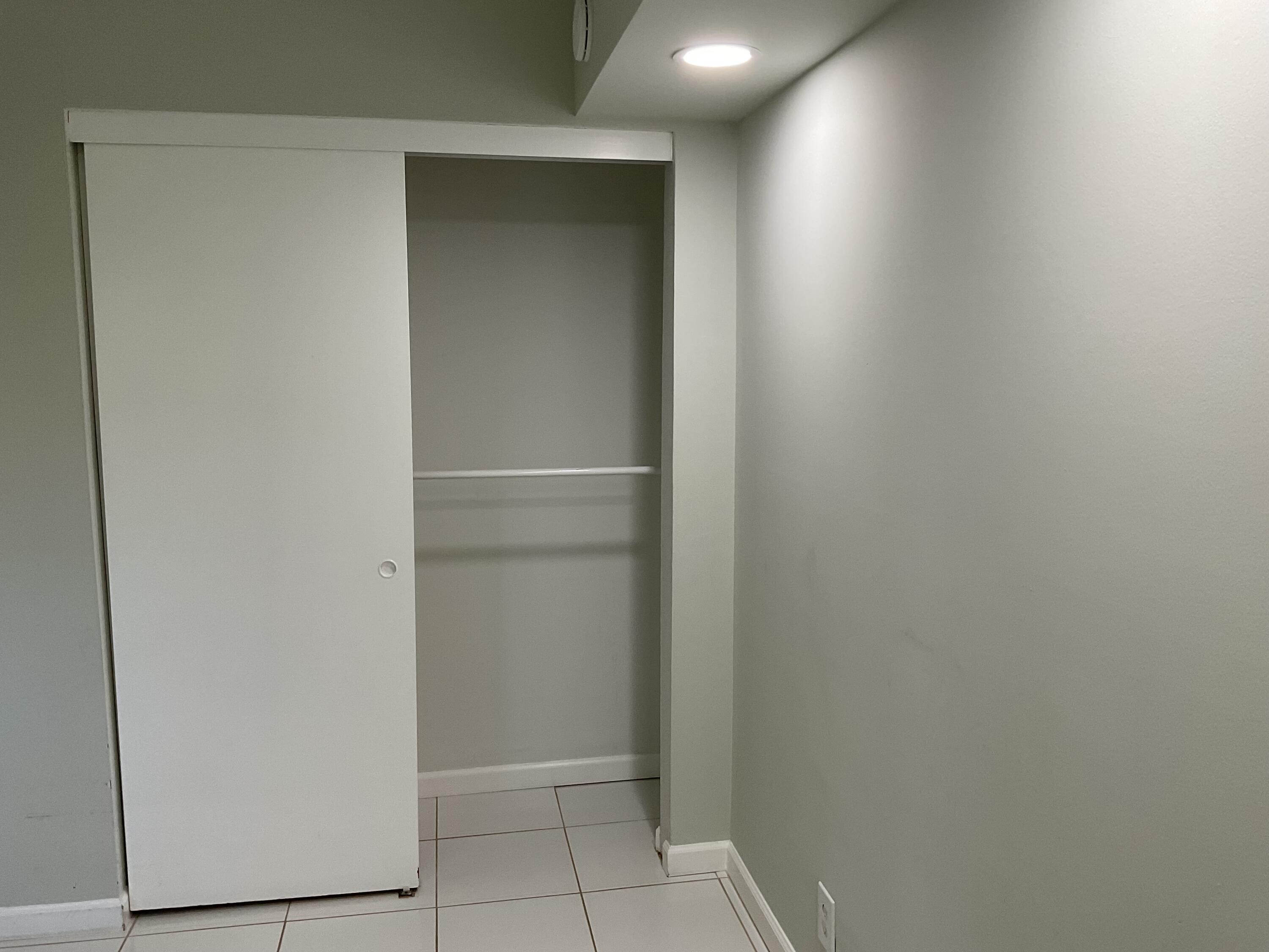 5751 Camino Del Sol, Unit 403 Boca Raton, FL 33433 - Photo 24 of 34 Guest bedroom closet