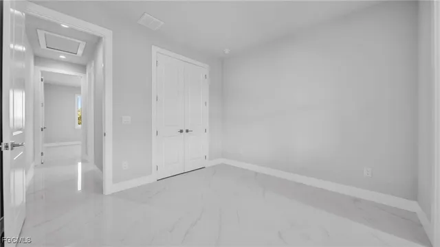 wooden floor and cabinet in an empty room
