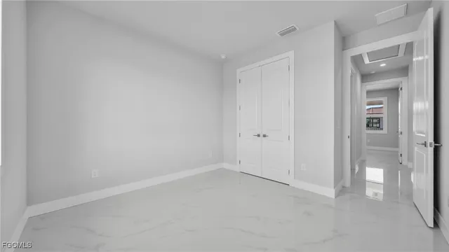 a view of an empty room with window