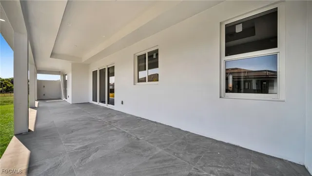 a kitchen with cabinets and a stove
