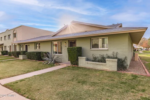 front view of a house with a patio