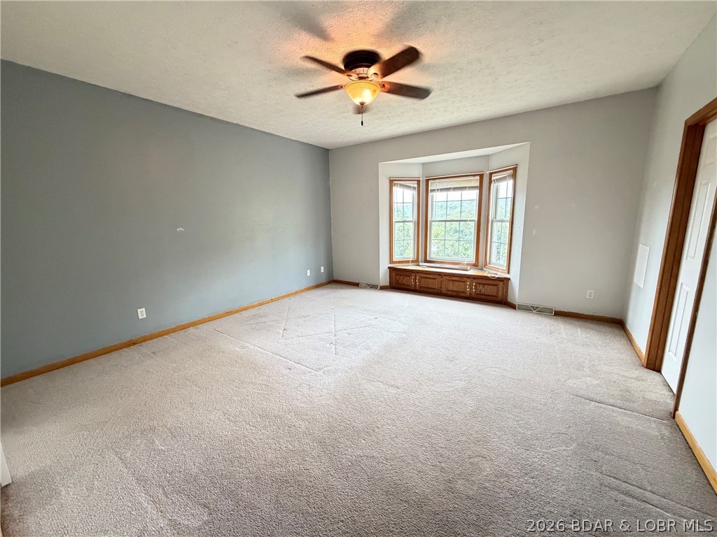 157 Sawmill Road St. Robert, MO 65584 - Photo 17 of 47 Primary Suite -bay window with seating and storage
