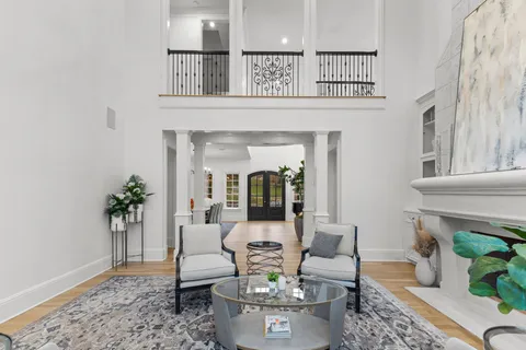 a view of roof deck with furniture and garden
