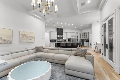 a kitchen with stainless steel appliances granite countertop a stove and a sink