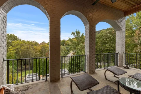 a kitchen with stainless steel appliances granite countertop a stove and a sink
